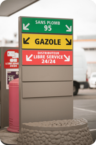 image d'une pompe à essences et diesel dans une station service TotalEnergies